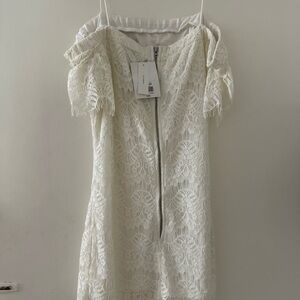 Little white dress so cute with boots or high heels..never worn